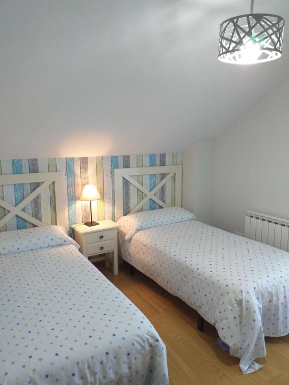 Posteľ alebo postele v izbe v ubytovaní Chalet Playa del Sable