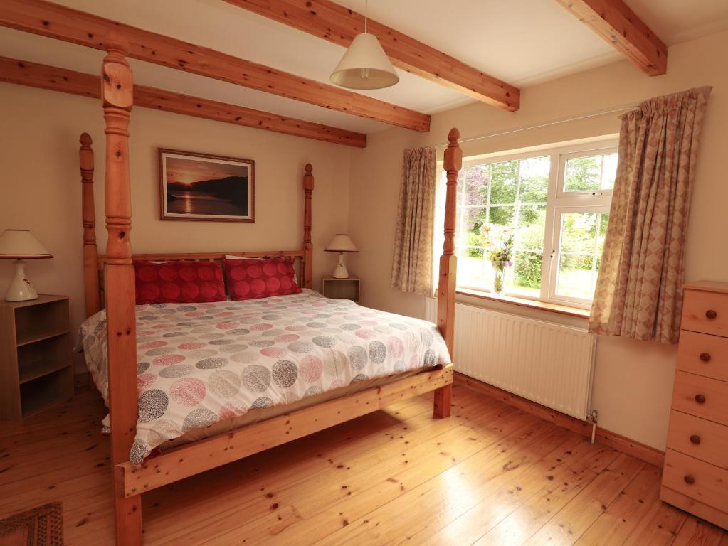 Postel nebo postele na pokoji v ubytování The Lodge