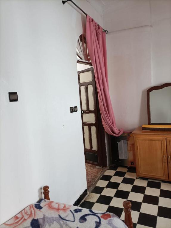 Postel nebo postele na pokoji v ubytování L'Oa