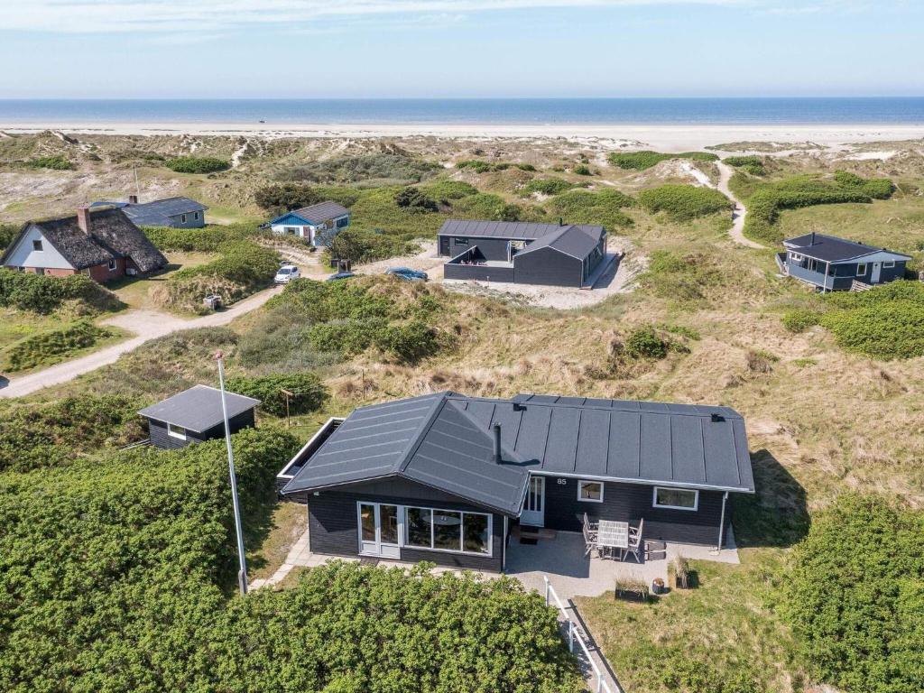 an aerial view of a house on the beach at Holiday home Fanø CXXXVIII in Fanø