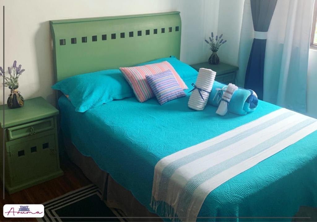 Letto o letti in una camera di Aruma Cuernavaca