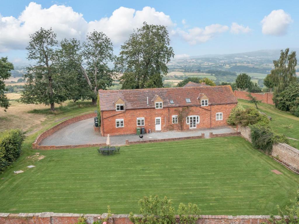 an aerial view of a house with a large lawn at The Chestnuts in Tenbury
