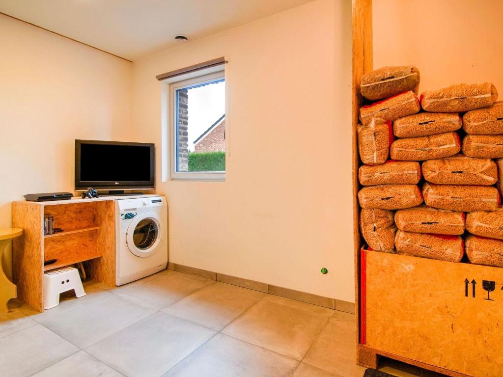 TV a/nebo společenská místnost v ubytování Holiday Home in Bocholt with Garden