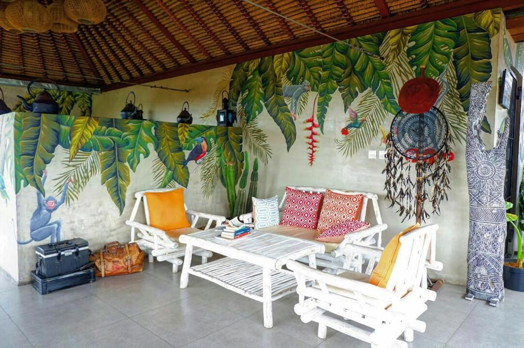 Posezení v ubytování MaxOneHotels at Ubud - CHSE Certified