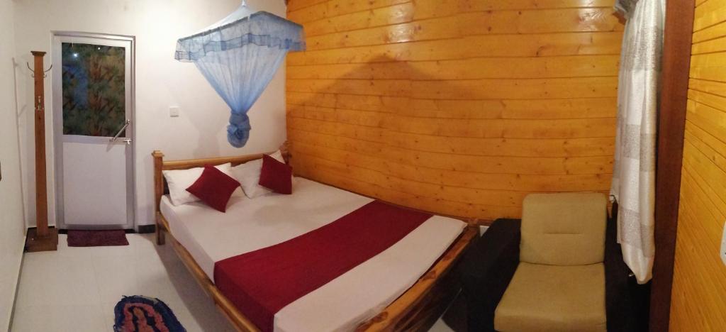Postel nebo postele na pokoji v ubytování DOT BEY beach cabana