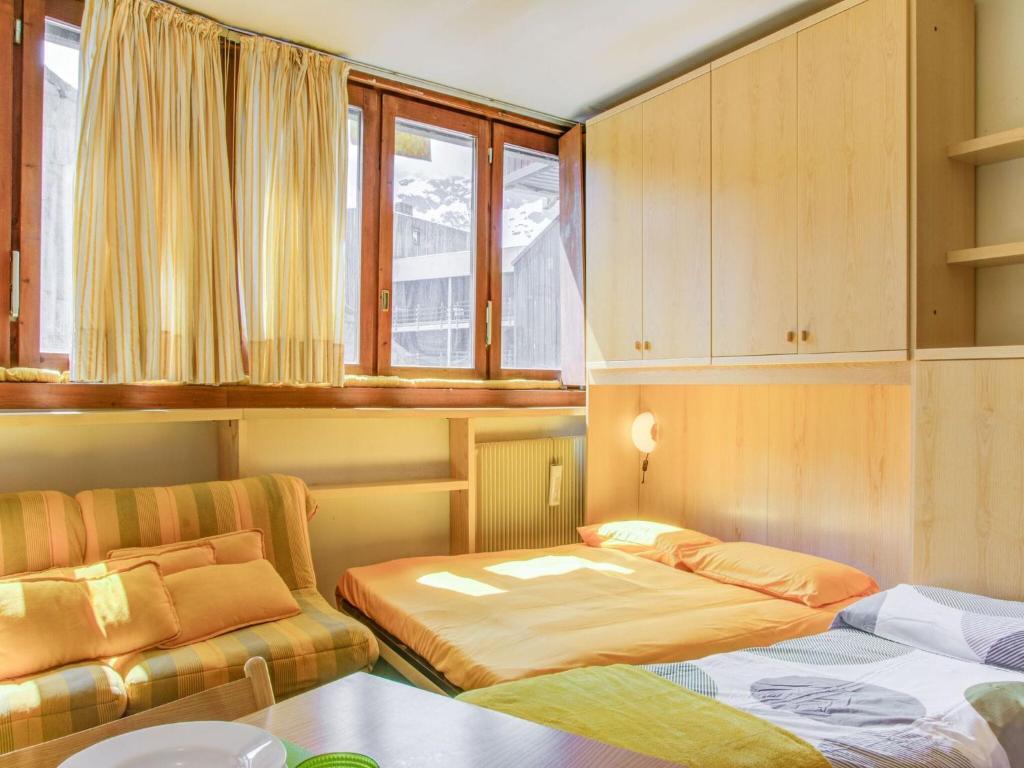Łóżko lub łóżka w pokoju w obiekcie Apartment in Cervinia in a ski resort
