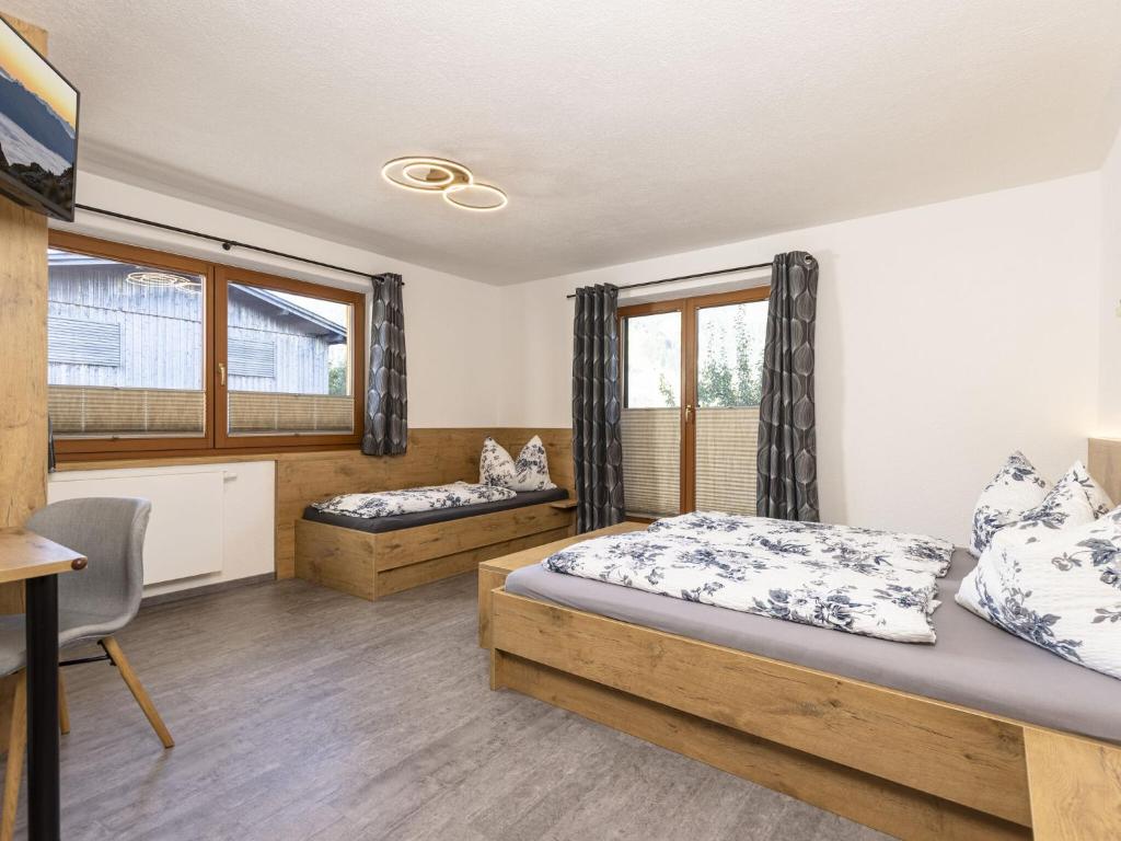 Postel nebo postele na pokoji v ubytování Holiday Home Ramsau near Ski Lifts