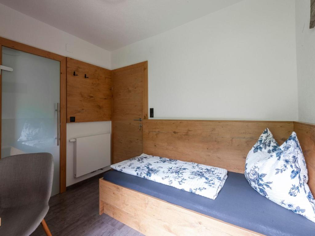 Postel nebo postele na pokoji v ubytování Holiday Home Ramsau near Ski Lifts