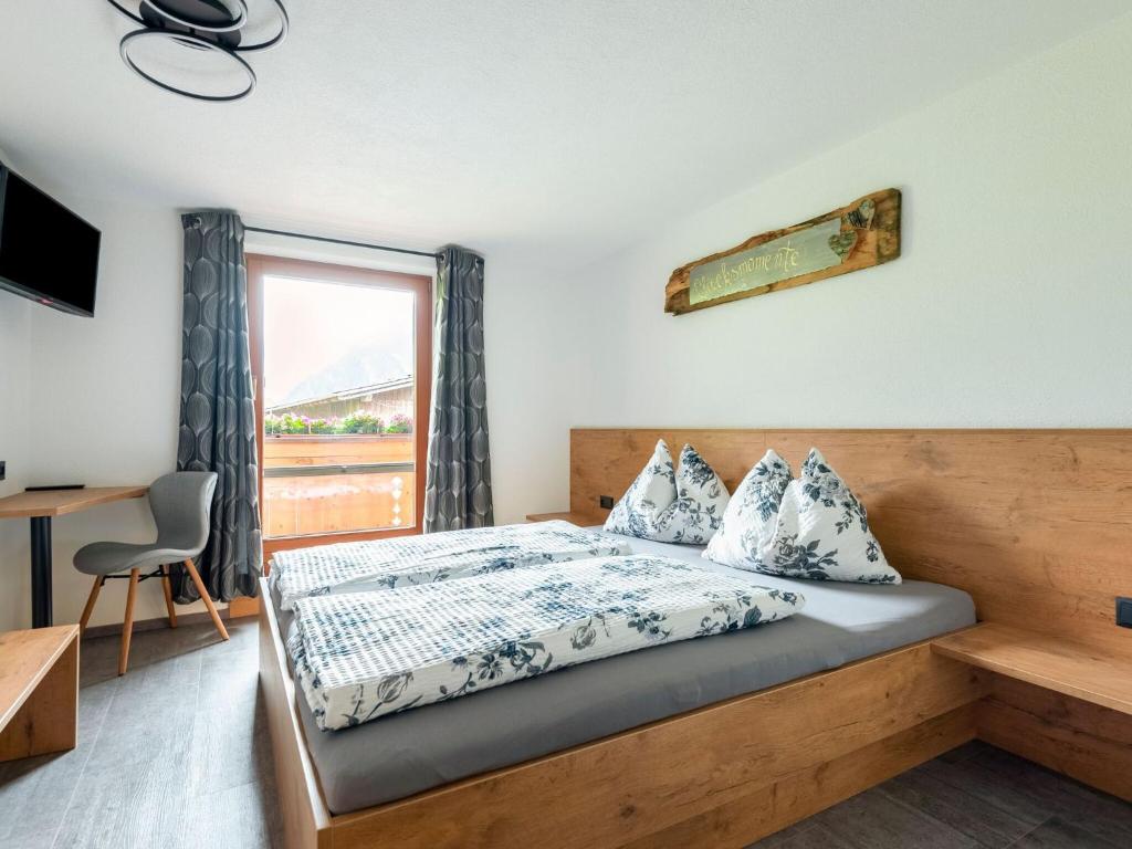 Postel nebo postele na pokoji v ubytování Holiday Home Ramsau near Ski Lifts