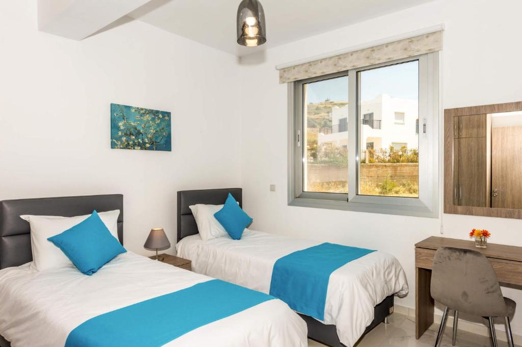 Postel nebo postele na pokoji v ubytování Elite Sea View Villa