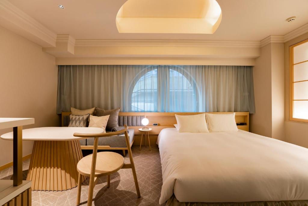 Postel nebo postele na pokoji v ubytování hotel hisoca ikebukuro
