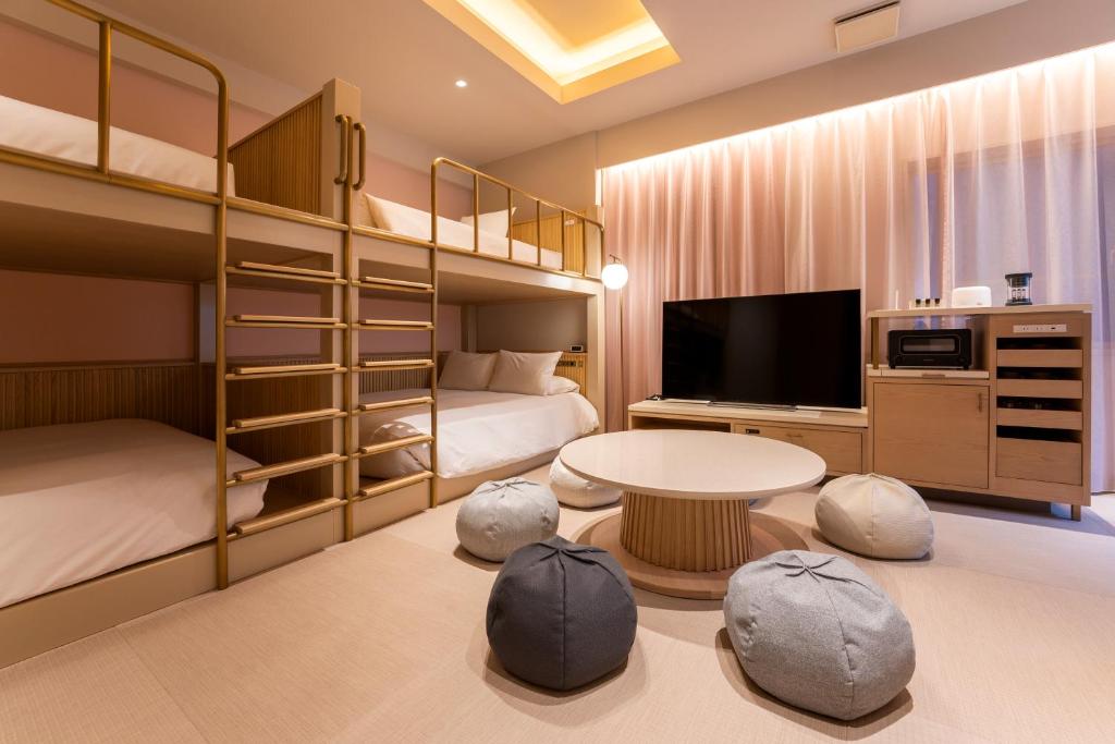 Postel nebo postele na pokoji v ubytování hotel hisoca ikebukuro