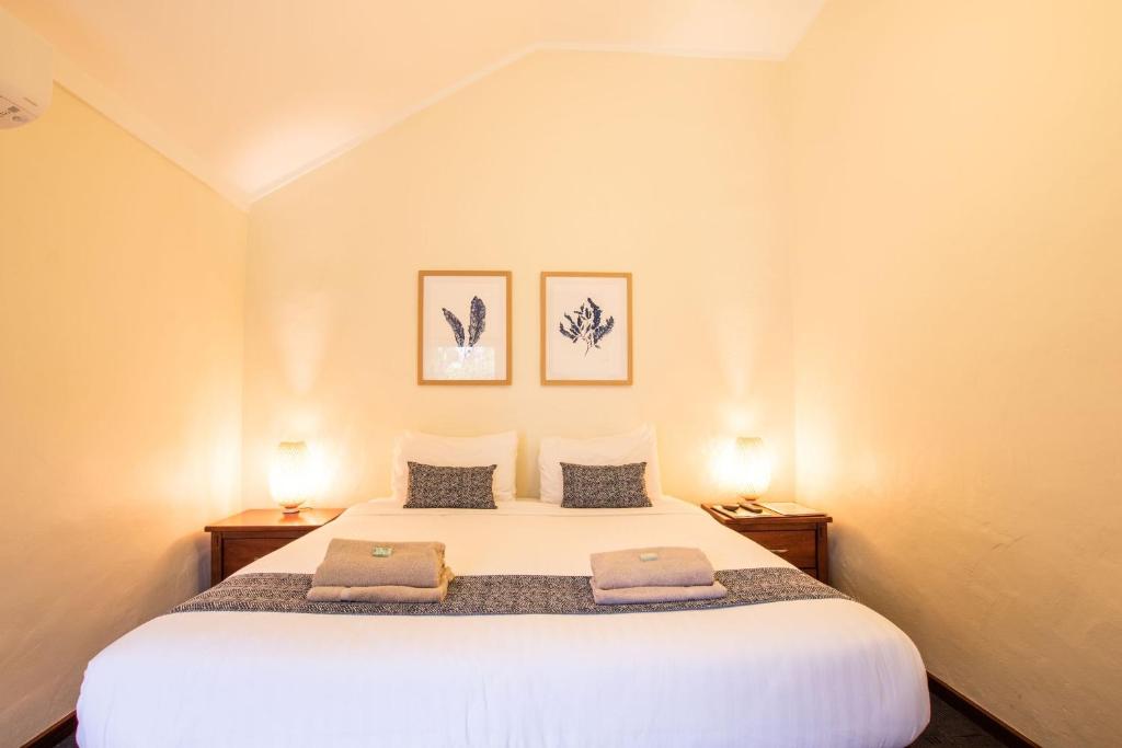 Ένα ή περισσότερα κρεβάτια σε δωμάτιο στο Surfpoint Resort