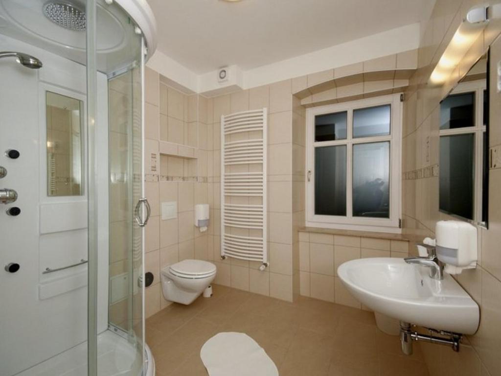 Koupelna v ubytování Hotel Villa Huber