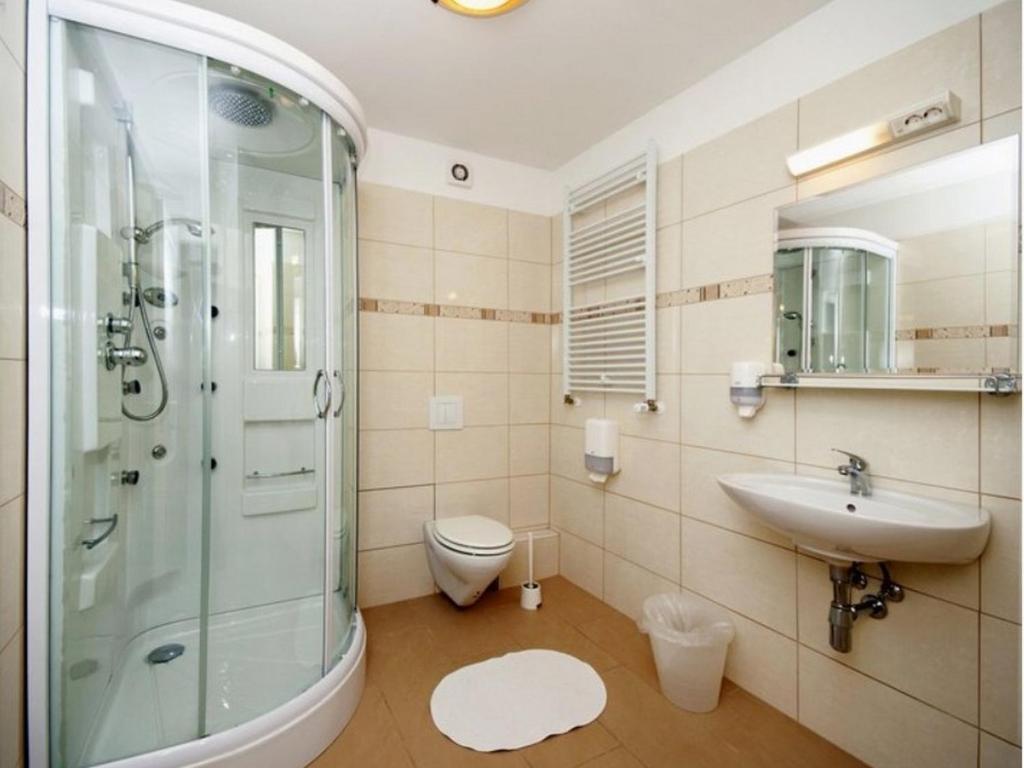 Koupelna v ubytování Hotel Villa Huber