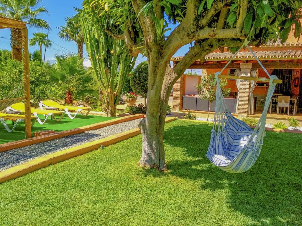 Vonkajšia záhrada v ubytovaní Cubo's Villa Family