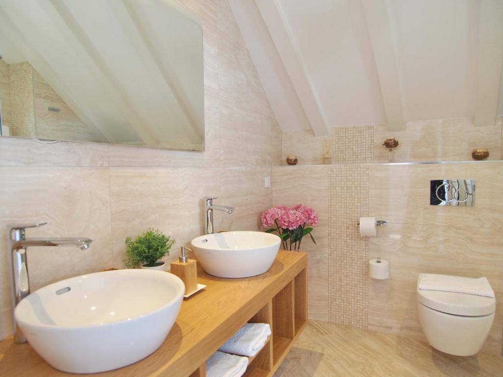 Koupelna v ubytování Apartment & Rooms Ivušić