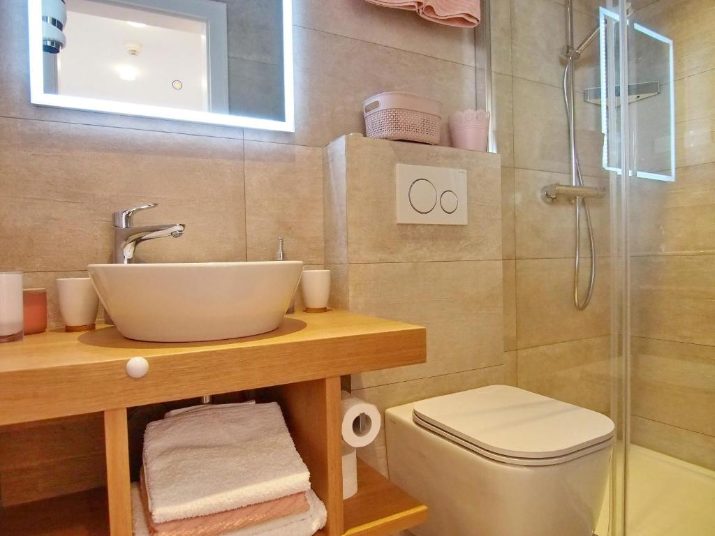 Koupelna v ubytování Apartment & Rooms Ivušić