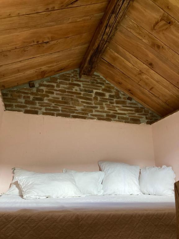 Postel nebo postele na pokoji v ubytování Il rifugio del Ghiro