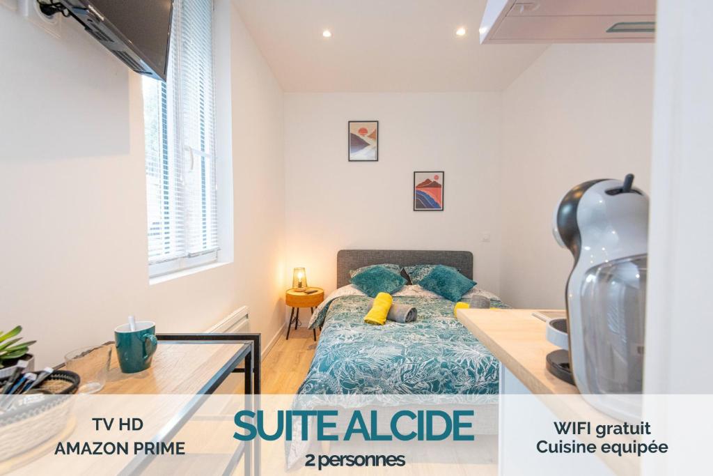 Säng eller sängar i ett rum på KASA Suite - Studio tout équipé et Cosy