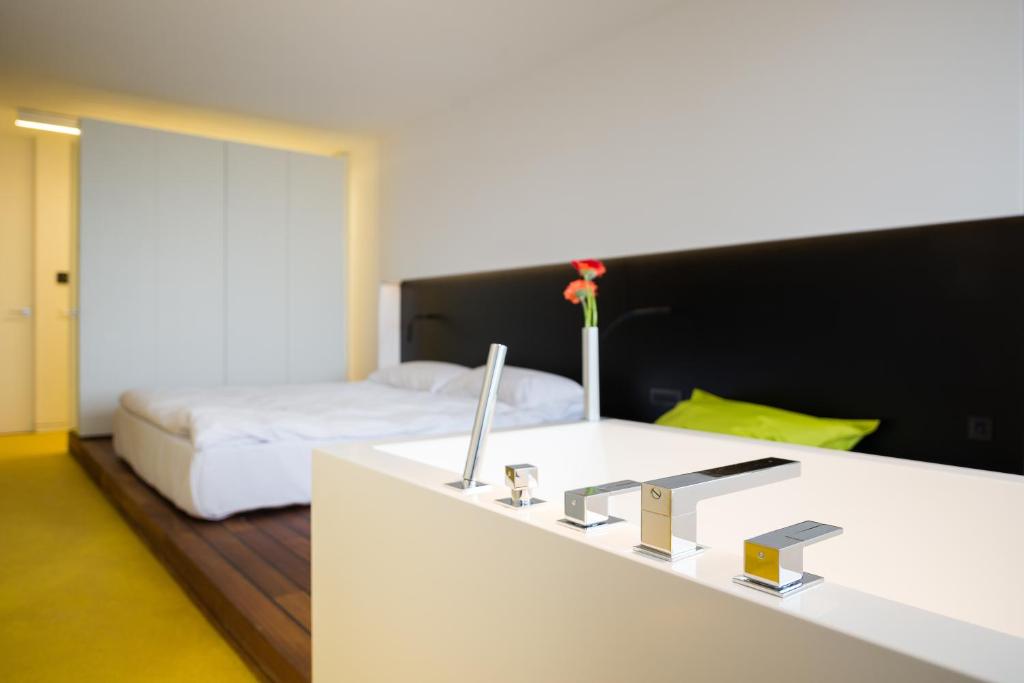 Postel nebo postele na pokoji v ubytování Hotel Privo