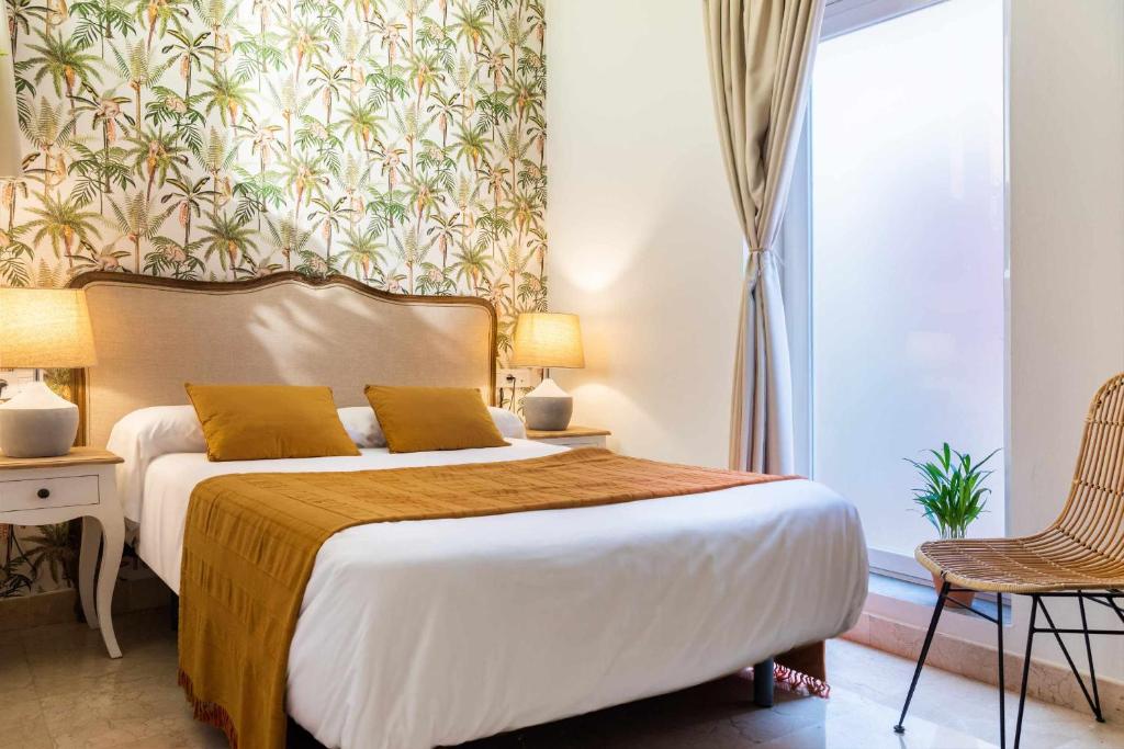 Łóżko lub łóżka w pokoju w obiekcie MonKeys Apartments Loft Pureza