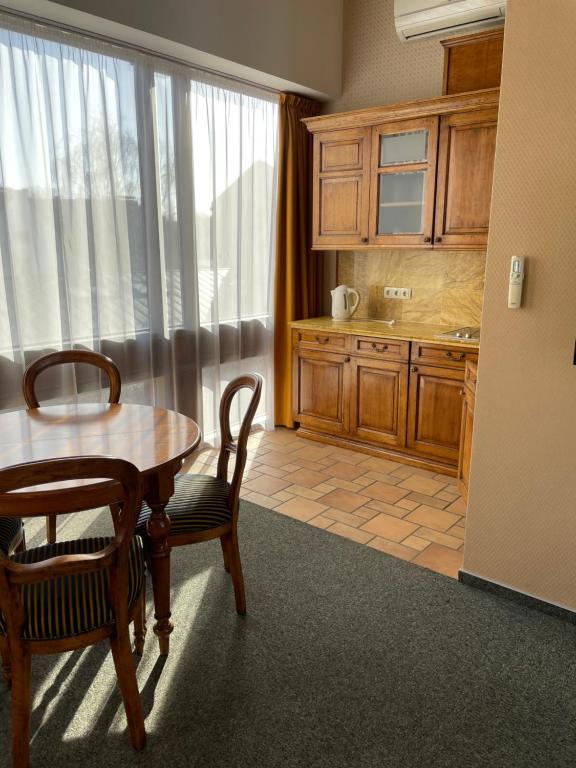 Kuchyň nebo kuchyňský kout v ubytování Apartment Senamiesčio Inkaras