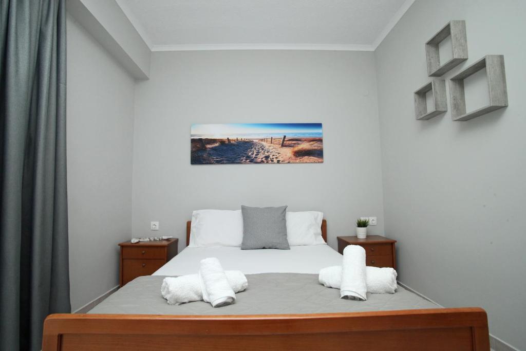 Posteľ alebo postele v izbe v ubytovaní Panorama Siviris