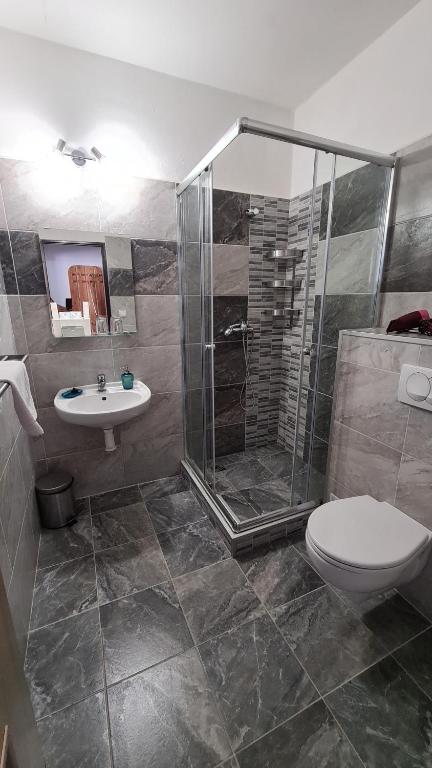Koupelna v ubytování Hotel Pangea