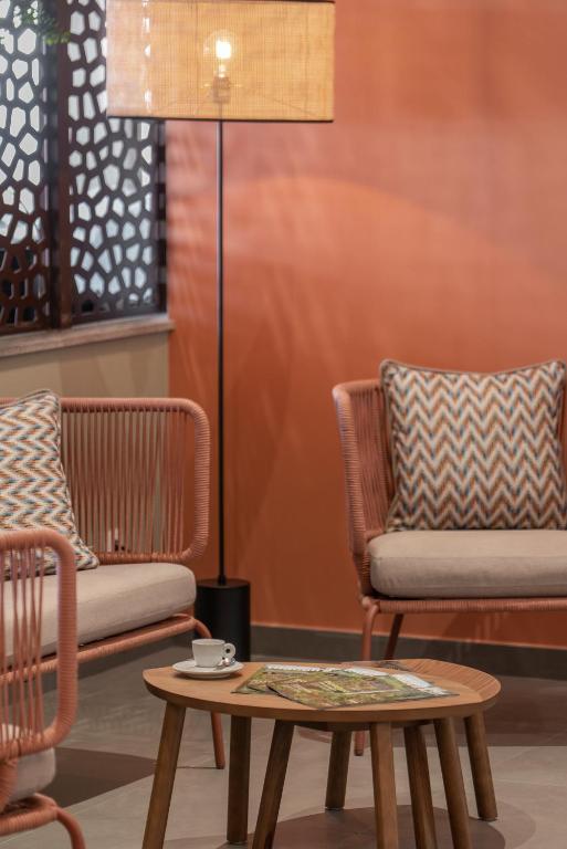 Posezení v ubytování Buganvilia Studio Hotel