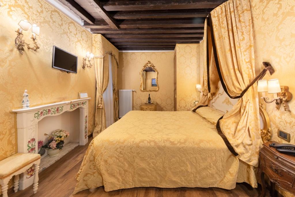 Postel nebo postele na pokoji v ubytování Residenza La Loggia