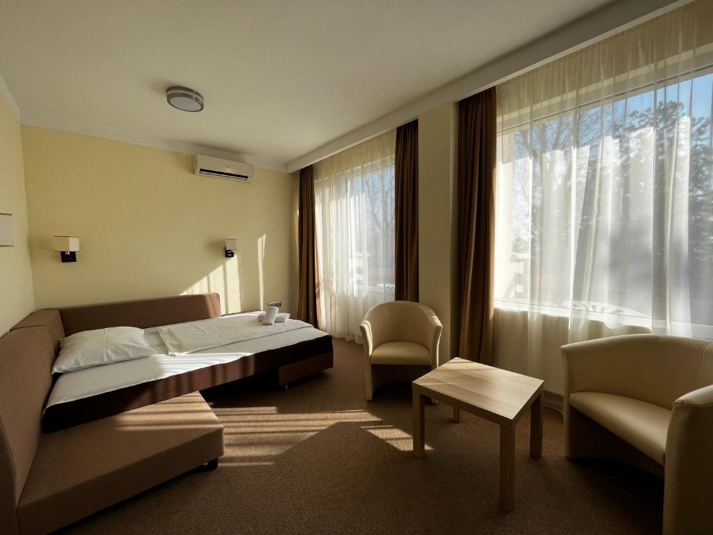 Postel nebo postele na pokoji v ubytování Nereus Park Hotel