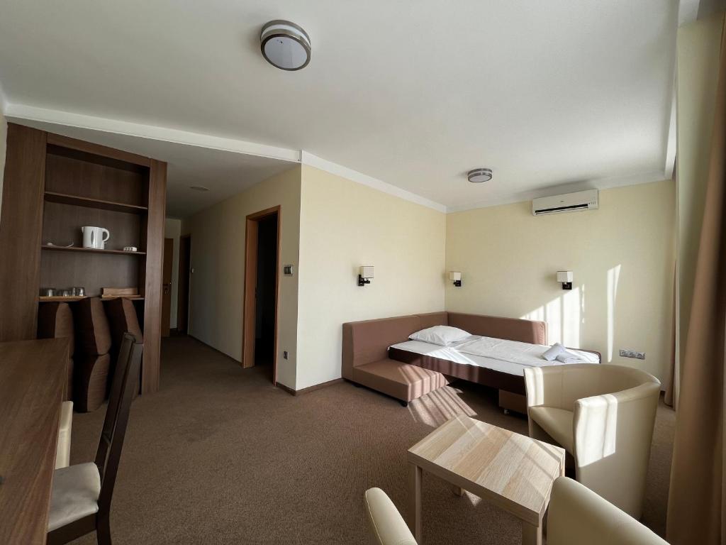 Postel nebo postele na pokoji v ubytování Nereus Park Hotel