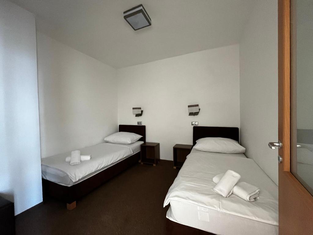 Postel nebo postele na pokoji v ubytování Nereus Park Hotel