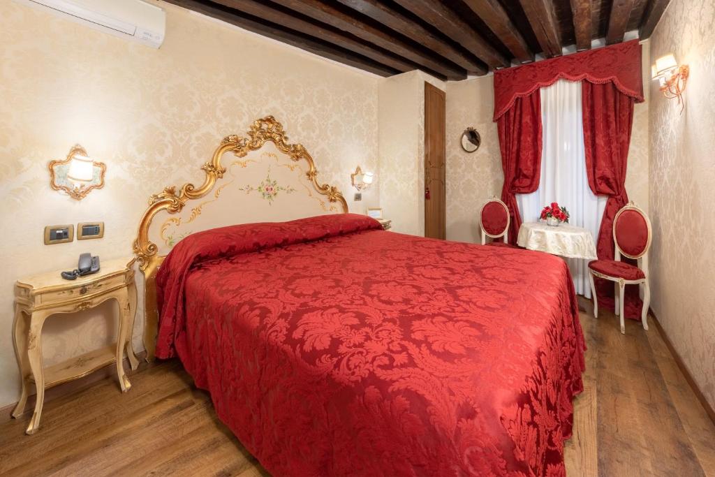 Postel nebo postele na pokoji v ubytování Residenza La Loggia