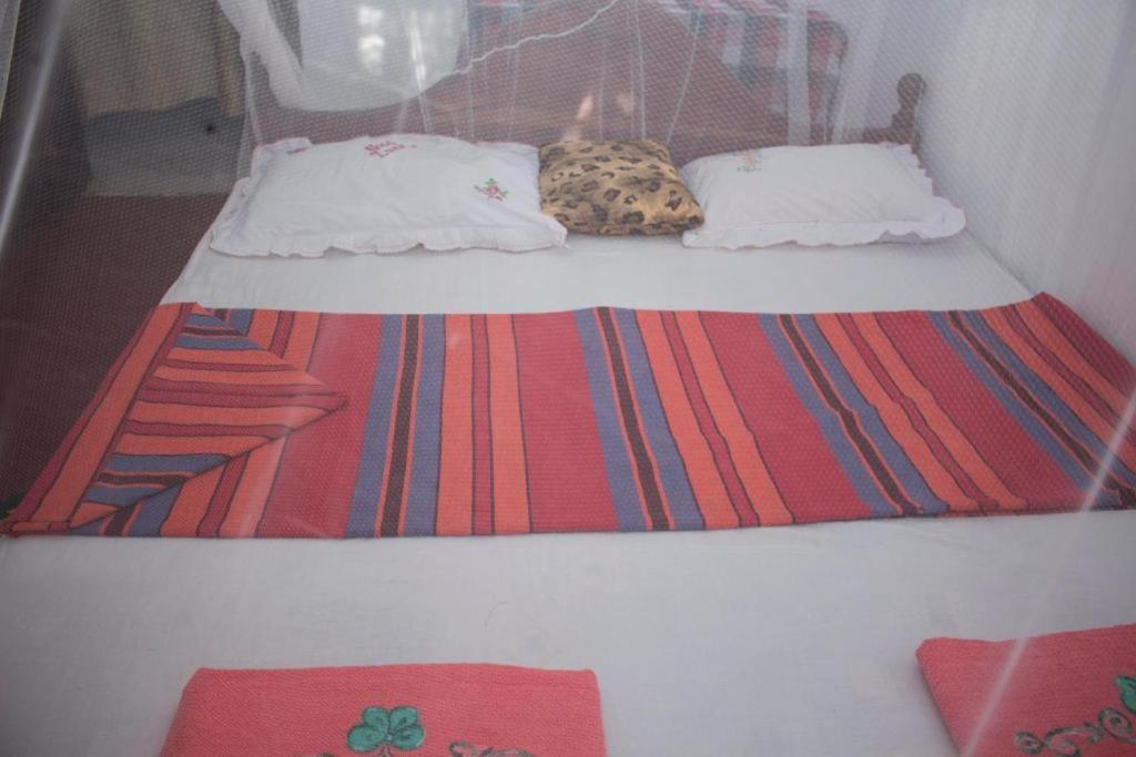 Postel nebo postele na pokoji v ubytování Sagopearl Guest