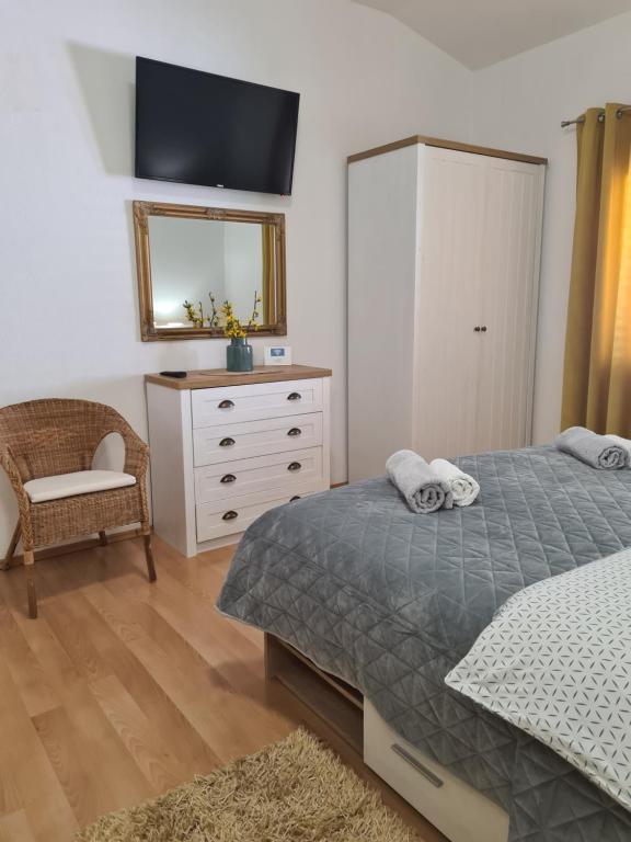Posteľ alebo postele v izbe v ubytovaní Apartments Marijan