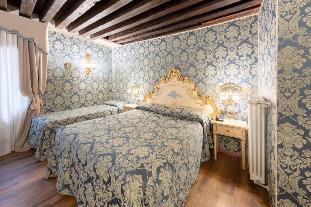 Postel nebo postele na pokoji v ubytování Residenza La Loggia