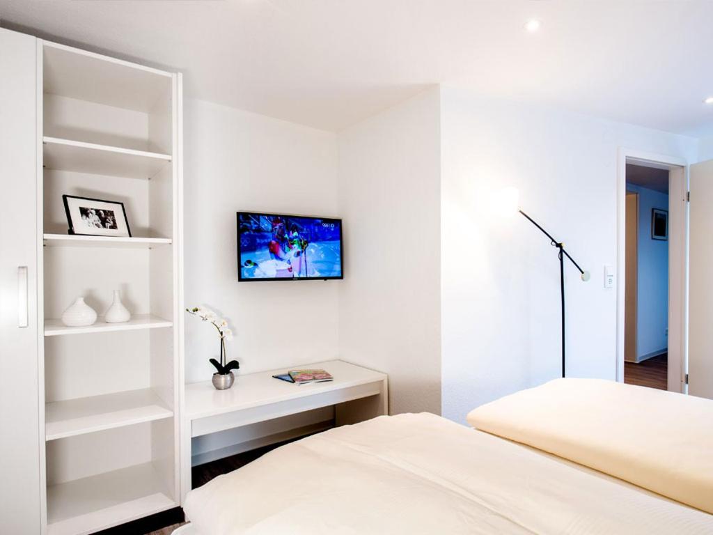 TV a/nebo společenská místnost v ubytování Hotel Busch