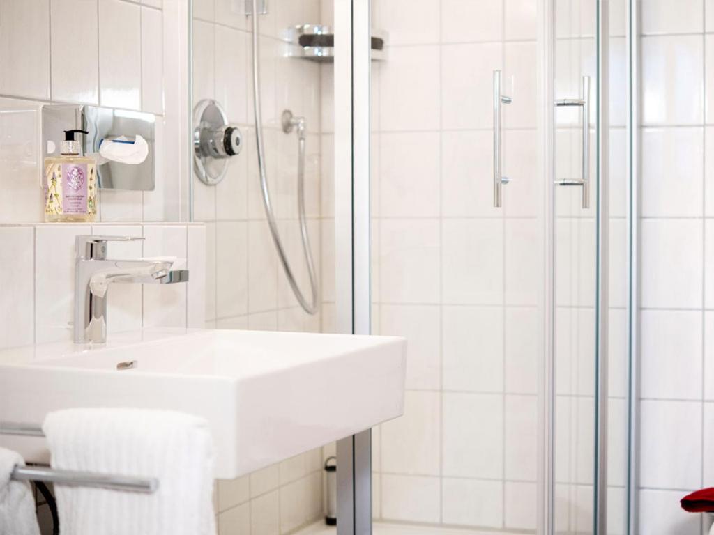 Koupelna v ubytování Hotel Busch
