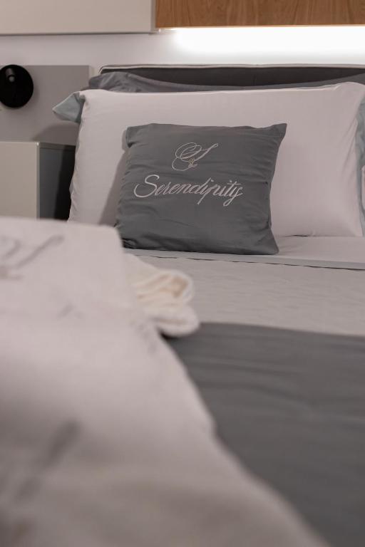 Postel nebo postele na pokoji v ubytování Serendipity B&B