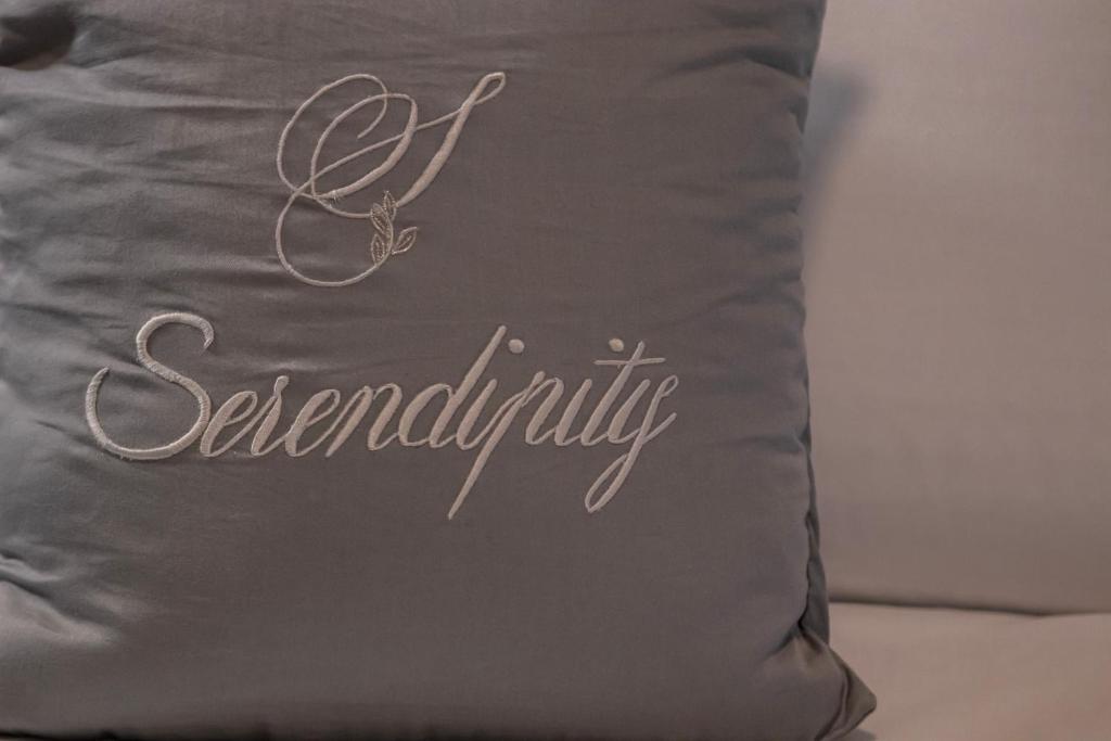 Postel nebo postele na pokoji v ubytování Serendipity B&B