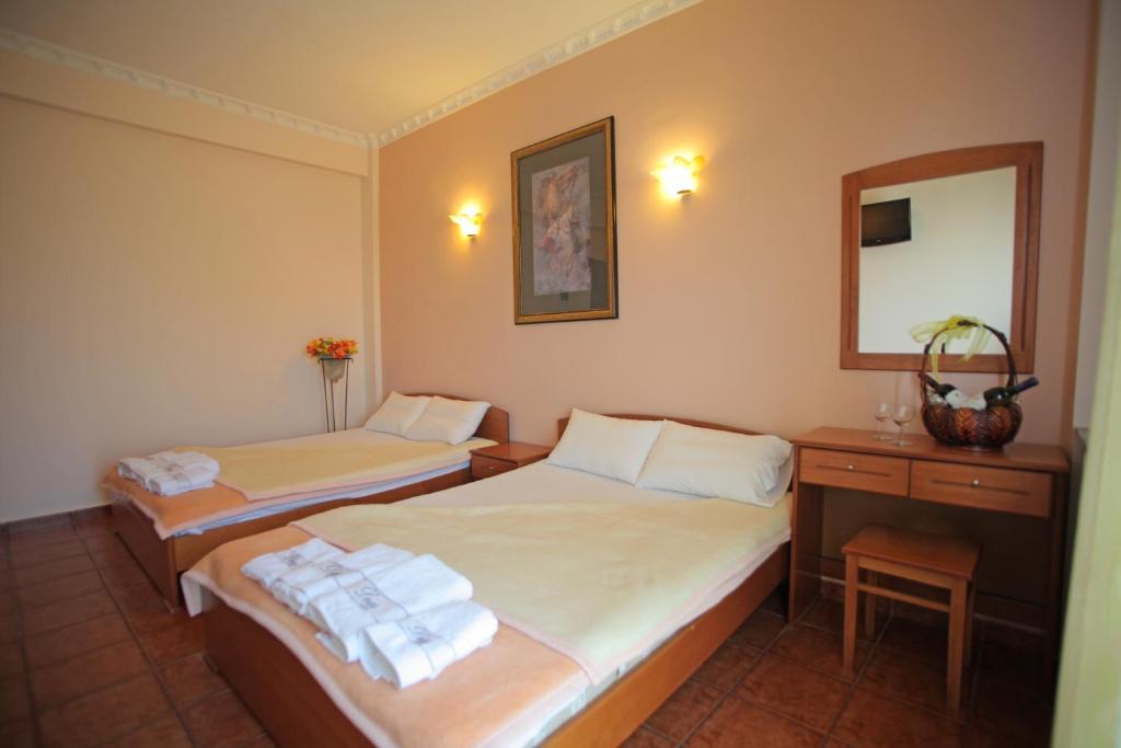 Postel nebo postele na pokoji v ubytování Hotel Dias