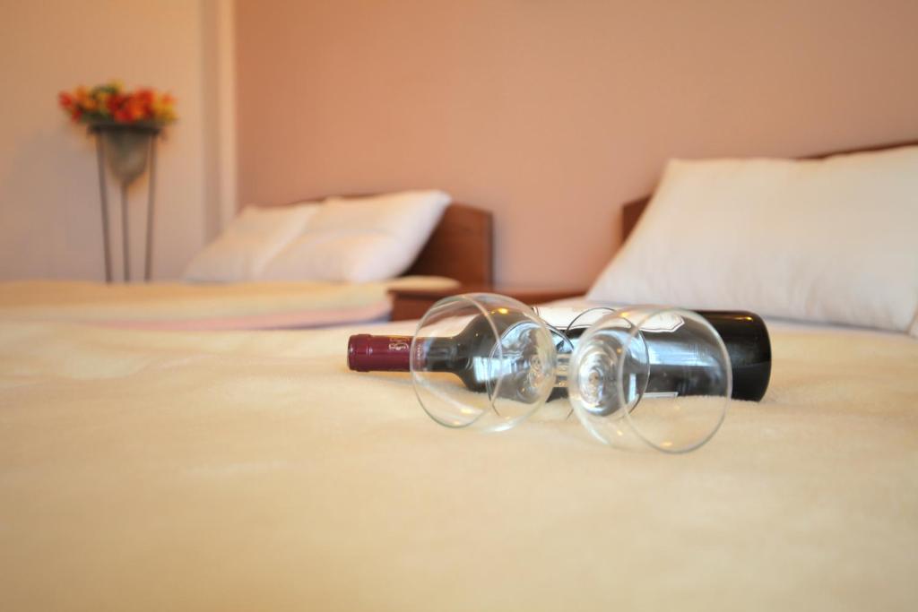 Postel nebo postele na pokoji v ubytování Hotel Dias
