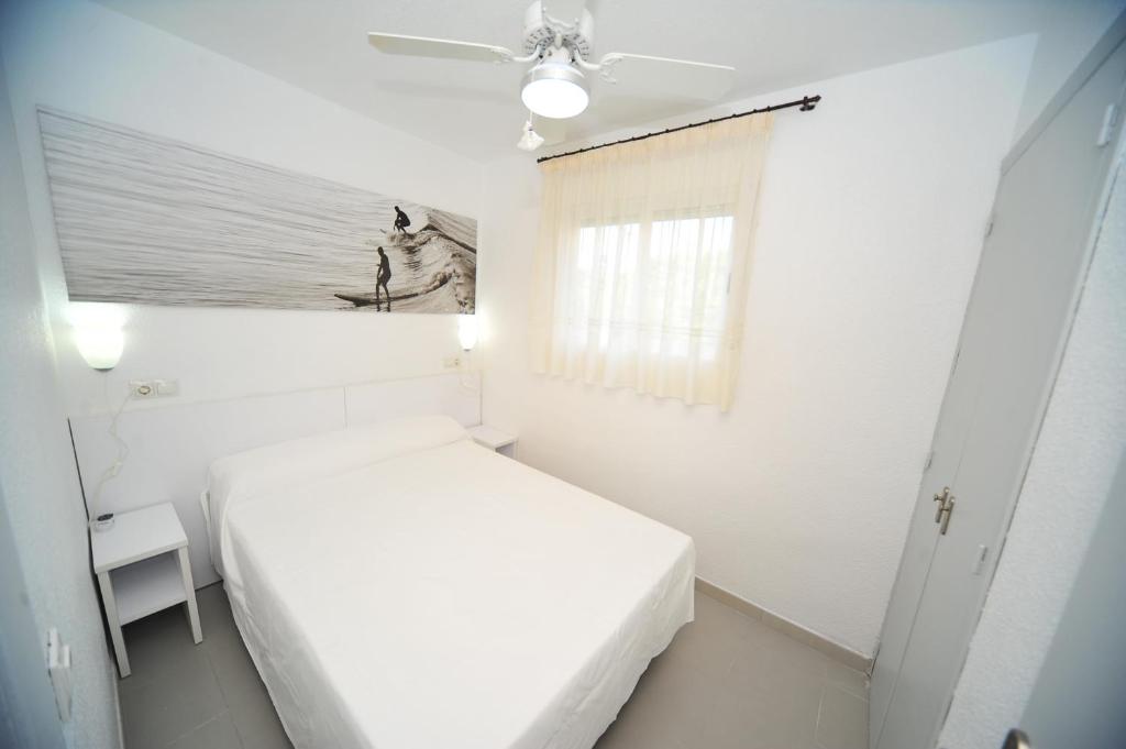 Postel nebo postele na pokoji v ubytování Apartamento Princicasim 1 dormitorio
