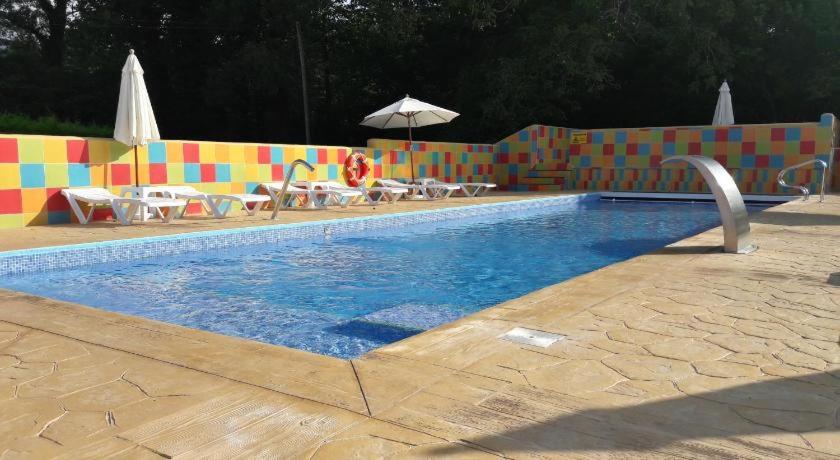 The swimming pool at or close to Hotel El Trasgu