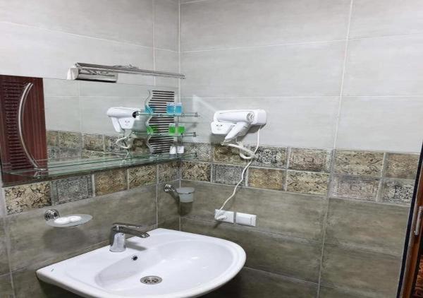 Koupelna v ubytování Hotel Dimasi