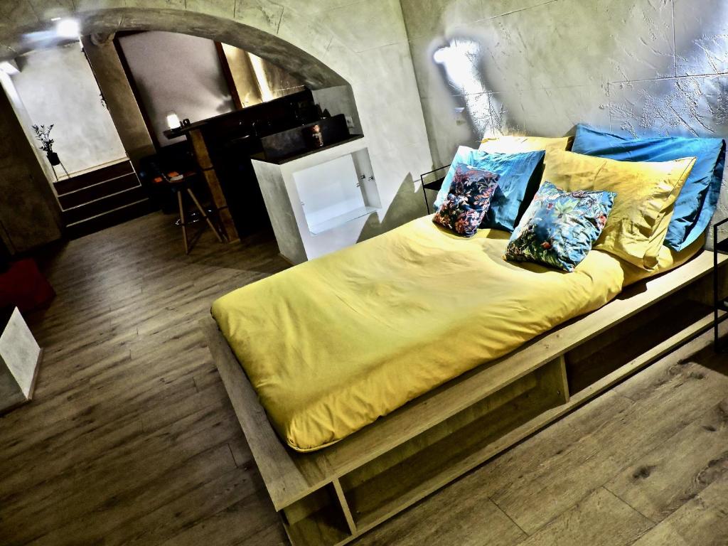 Posteľ alebo postele v izbe v ubytovaní Collegio Suite