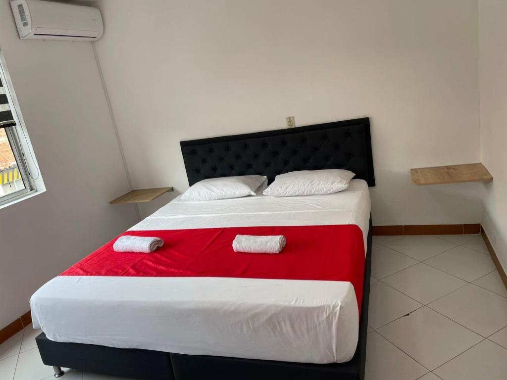 Postel nebo postele na pokoji v ubytování Hotel Picasso 70