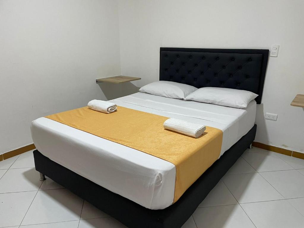 Postel nebo postele na pokoji v ubytování Hotel Picasso 70